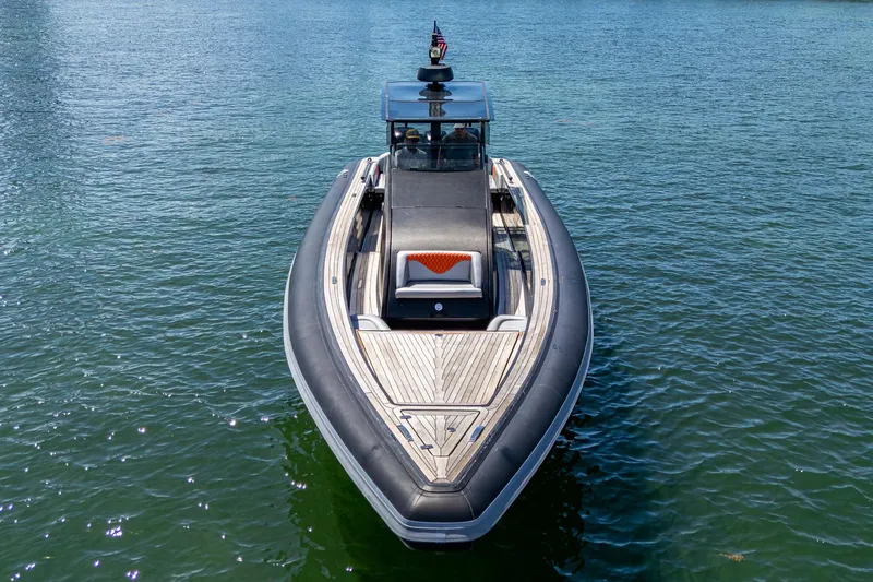 Fightertown Yacht Photos Pics 2019 Technohull OMEGA 45 boat on water, front view, sleek design.