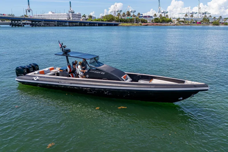 Fightertown Yacht Photos Pics 2019 Technohull OMEGA 45 boat on water, featuring sleek design and powerful engines.