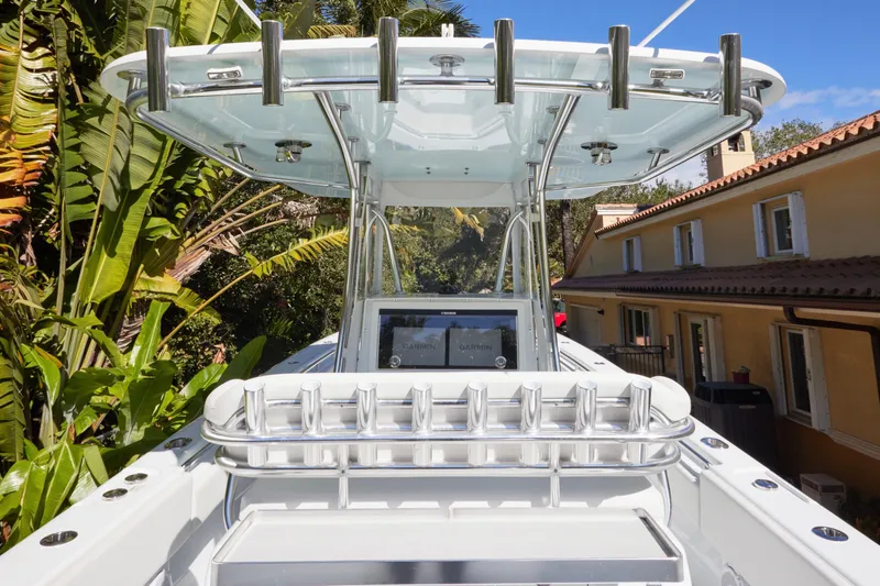  Yacht Photos Pics 2024 Contender 35 ST boat with sleek design, rod holders, and advanced navigation system.