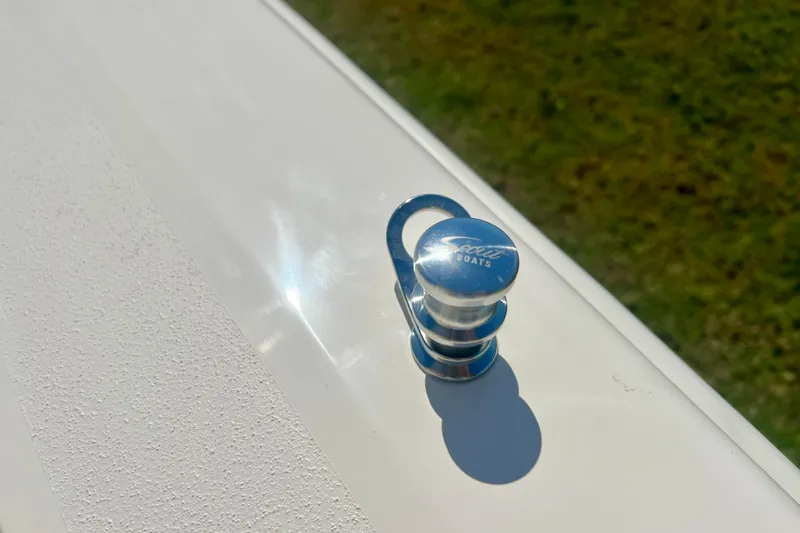  Yacht Photos Pics Close-up of a 2026 Scout 357 LXF boat cleat in sunlight.