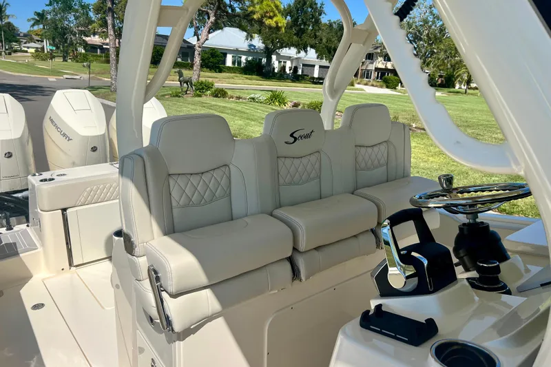  Yacht Photos Pics 2026 Scout 357 LXF boat interior with luxurious seating and modern steering console.