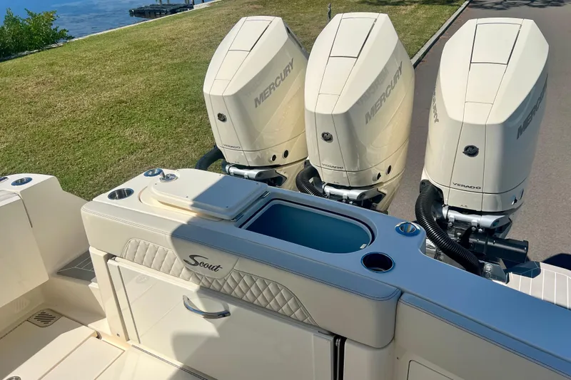  Yacht Photos Pics 2026 Scout 357 LXF boat with triple Mercury Verado engines, docked by the water.