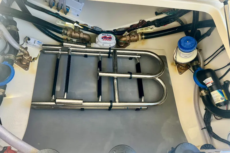  Yacht Photos Pics 2026 Scout 357 LXF boat interior with ladder and marine equipment.