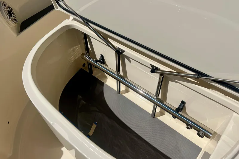  Yacht Photos Pics 2026 Scout 357 LXF boat storage compartment with stainless steel railings.