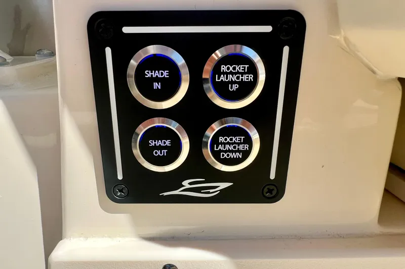  Yacht Photos Pics Control panel on 2026 Scout 357 LXF boat with shade and rocket launcher buttons.