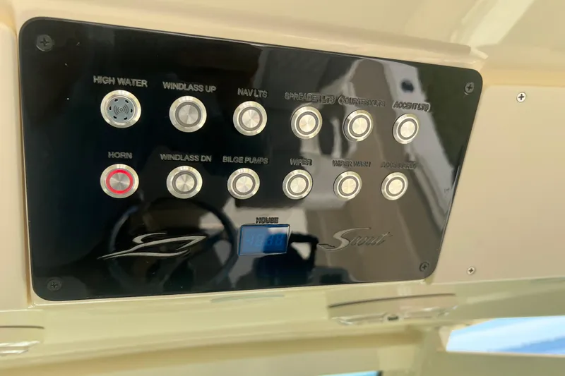 Yacht Photos Pics Control panel of 2026 Scout 357 LXF boat with labeled buttons and digital display.
