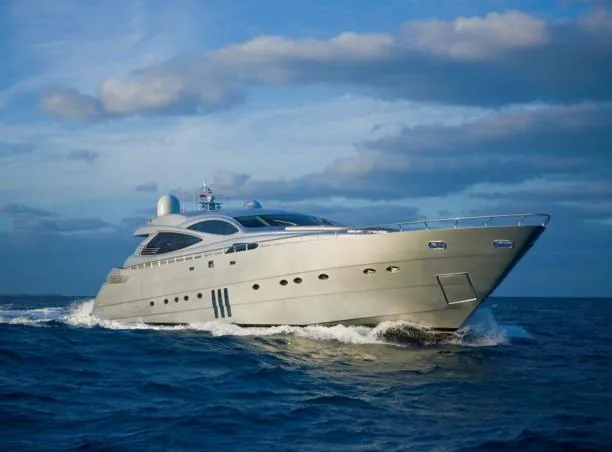 Gamma Yacht Photos Pics Luxury 2007 Pershing 115 yacht cruising on open sea under blue sky.