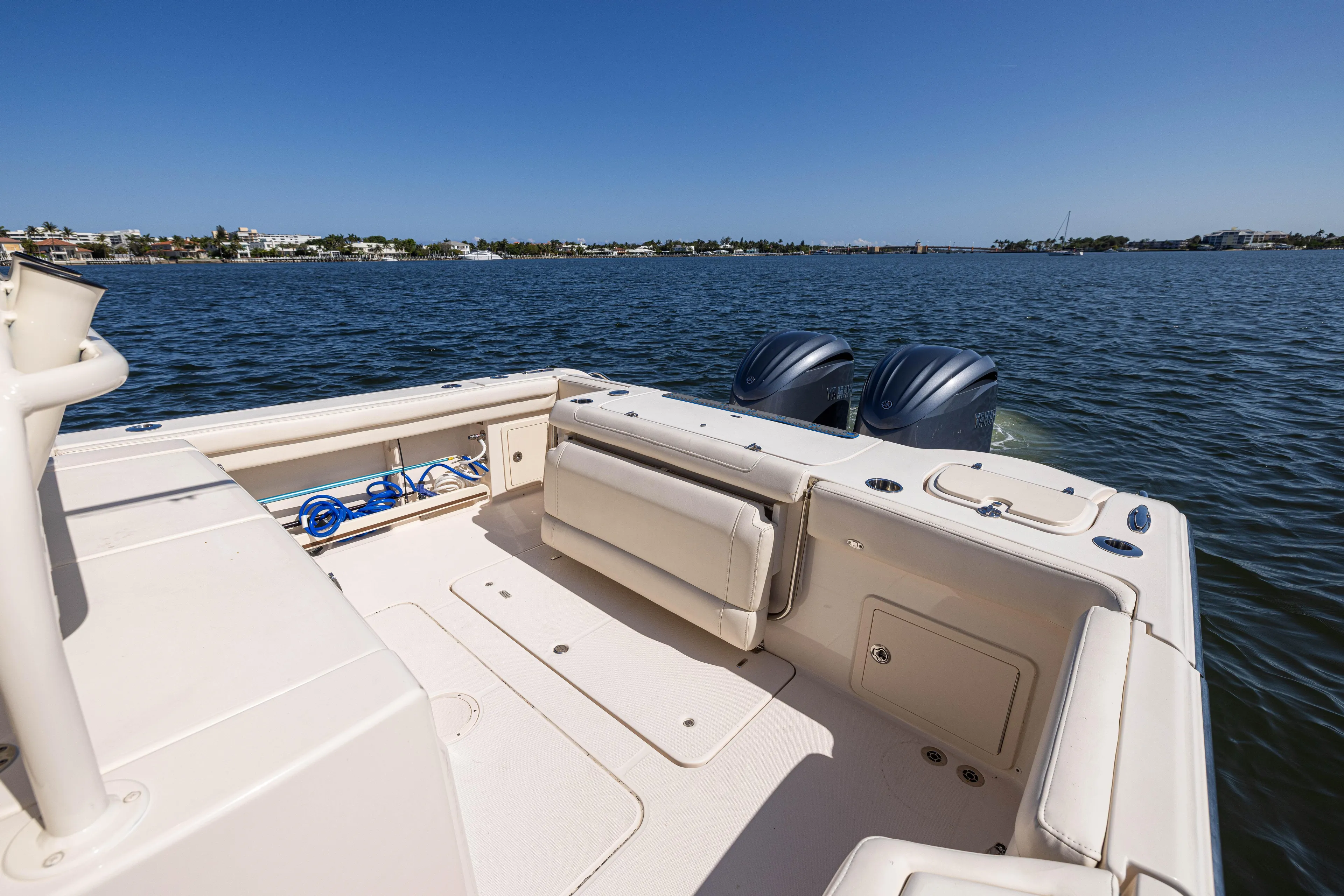 Purple Bags 2 Yacht Photos Pics 2023 Grady-White Canyon 326 boat on calm water, featuring dual outboard motors.