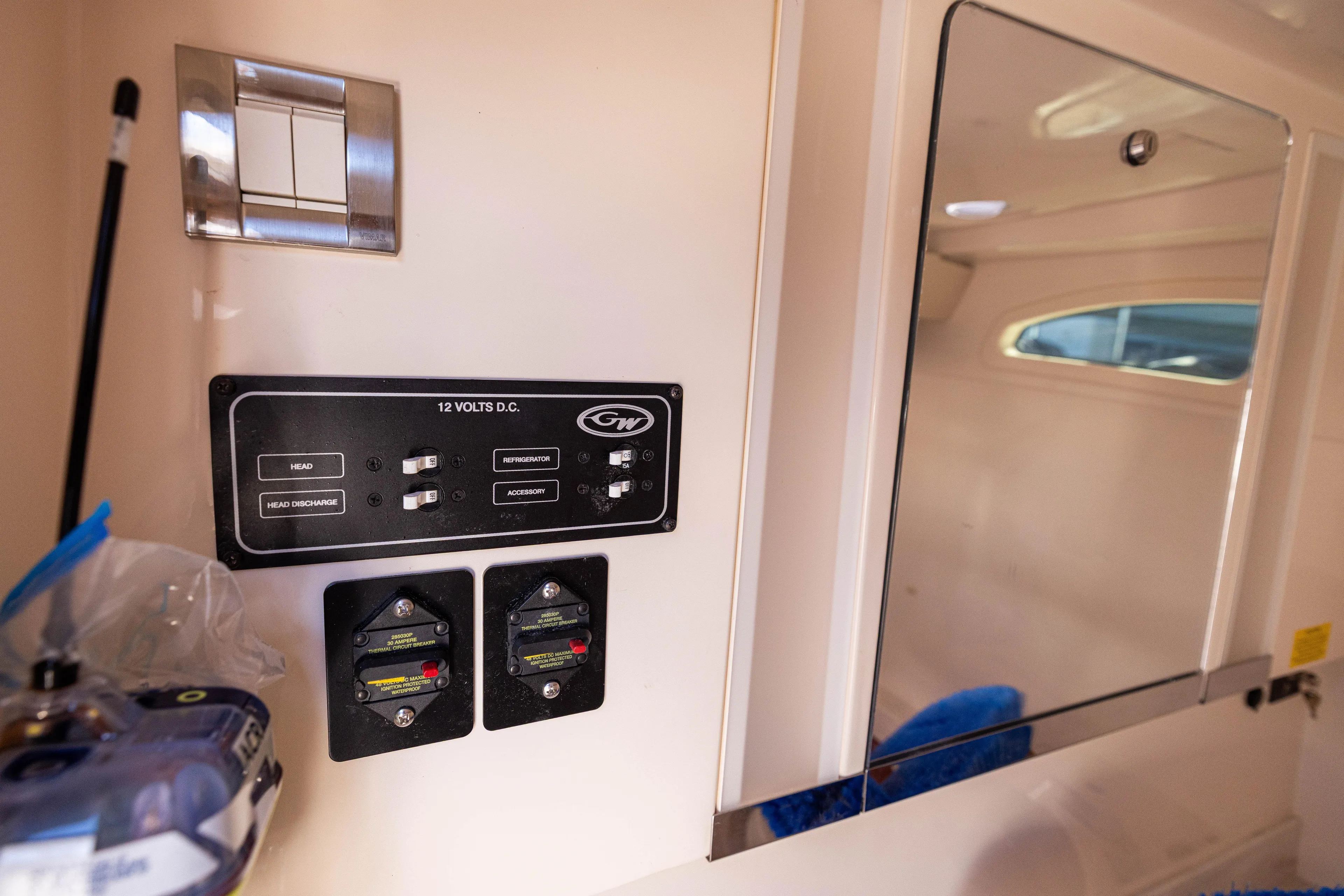 Purple Bags 2 Yacht Photos Pics Control panel inside 2023 Grady-White Canyon 326 boat cabin.