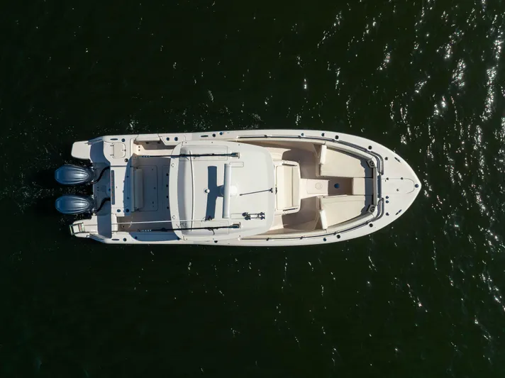 Purple Bags 2 Yacht Photos Pics Aerial view of 2023 Grady-White Canyon 326 boat on water.