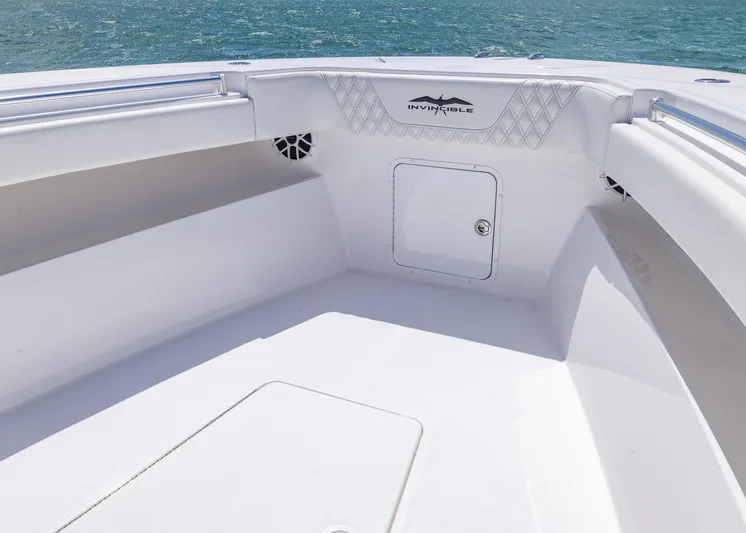  Yacht Photos Pics 2025 Invincible 43 Open Fisherman boat interior with storage compartment and sleek design.