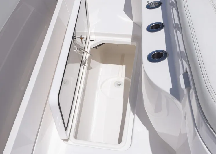 Yacht Photos Pics 2025 Invincible 43 Open Fisherman boat storage compartment with rod holders.