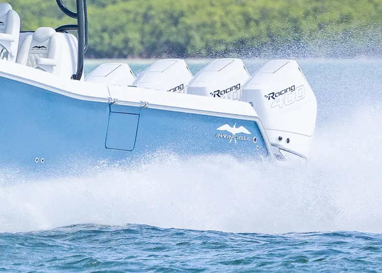  Yacht Photos Pics 2025 Invincible 43 Open Fisherman speeding on water with powerful engines.