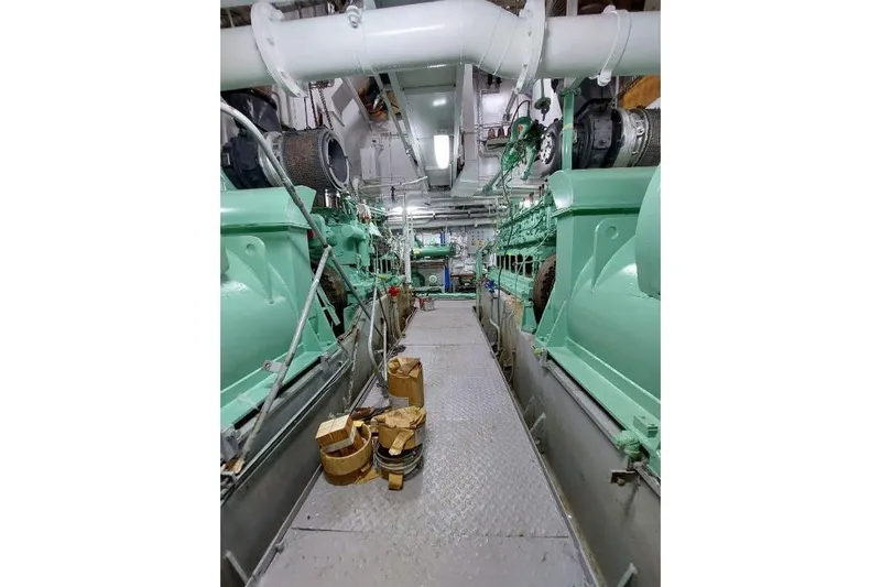  Yacht Photos Pics Engine room of 1974 SCHICHAU UNTERWESER AG Expedition Vessel, showcasing machinery and equipment.