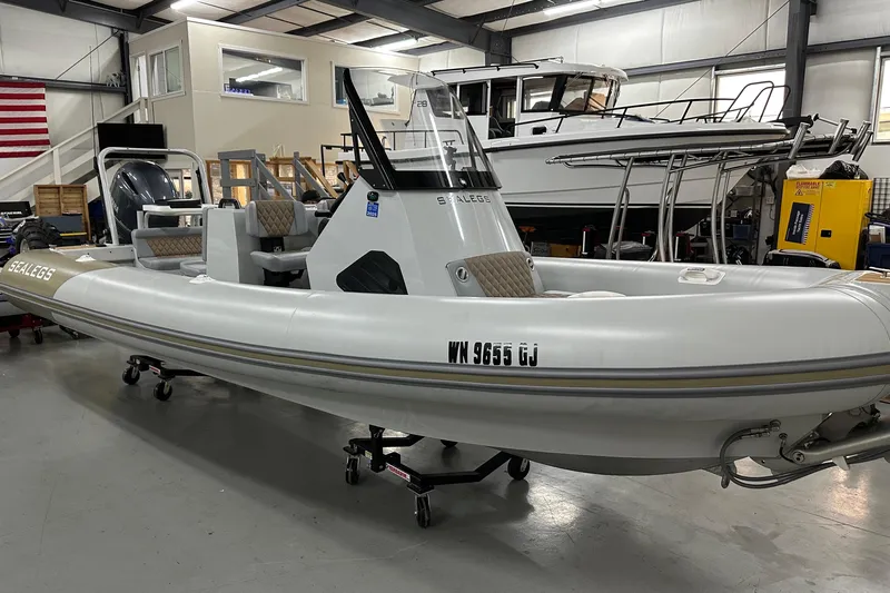  Yacht Photos Pics 2022 Sealegs 7.5M amphibious boat in showroom, featuring sleek design and advanced technology.