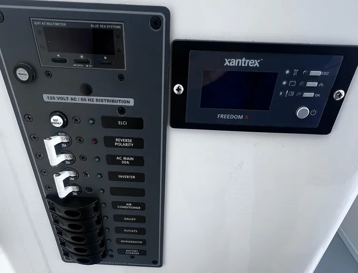  Yacht Photos Pics Electrical control panel on 2022 Steiger Craft 31 Chesapeake boat, featuring Xantrex Freedom X display.