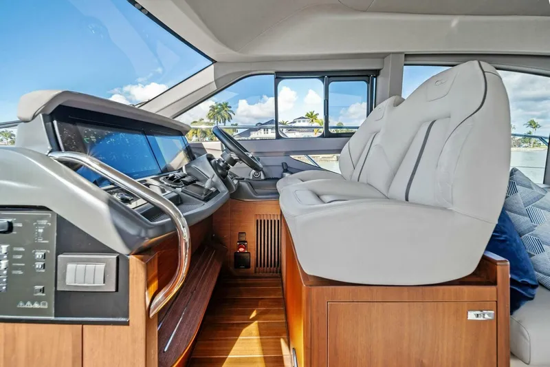 R&r Yacht Photos Pics Luxurious 2023 Princess F50 yacht interior with modern helm and plush seating.