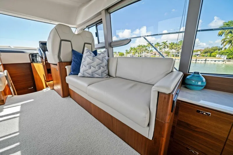 R&r Yacht Photos Pics Luxurious interior of 2023 Princess F50 yacht with elegant seating and scenic views.
