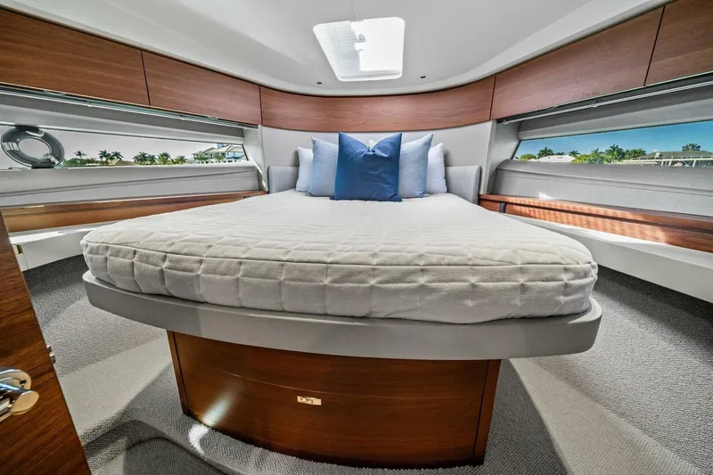 R&r Yacht Photos Pics Luxurious 2023 Princess F50 yacht bedroom with modern design and elegant wood accents.