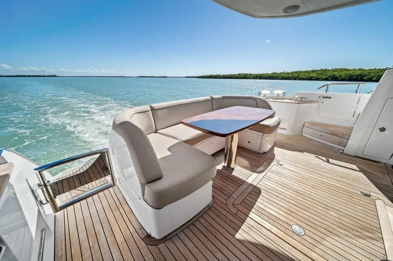 R&r Yacht Photos Pics Luxurious 2023 Princess F50 yacht deck with elegant seating and ocean view.