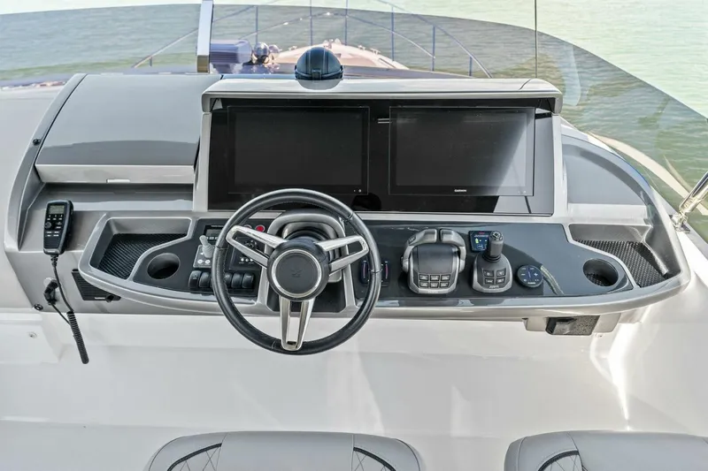 R&r Yacht Photos Pics 2023 Princess F50 yacht helm with modern controls and dual displays.