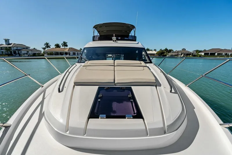 R&r Yacht Photos Pics 2023 Princess F50 yacht on serene water, showcasing luxurious deck and sleek design.