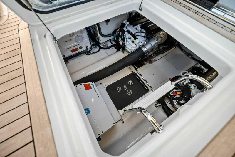 R&r Yacht Photos Pics Engine compartment of 2023 Princess F50 yacht, showcasing mechanical components and equipment.