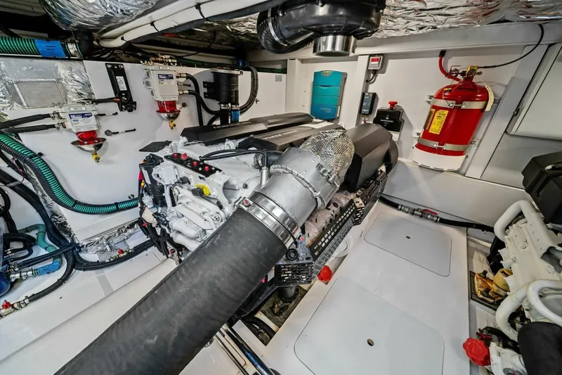 R&r Yacht Photos Pics Engine room of 2023 Princess F50 yacht with advanced machinery and safety equipment.