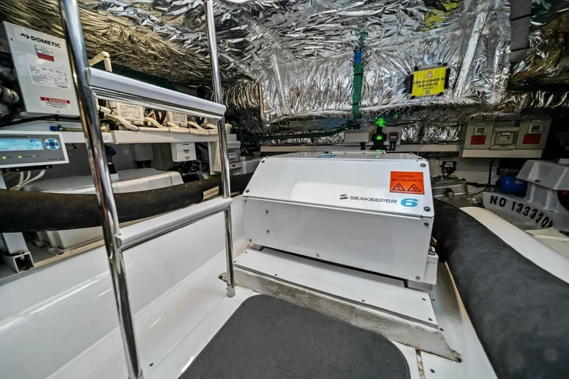 R&r Yacht Photos Pics Engine room of 2023 Princess F50 yacht featuring Seakeeper 6 stabilizer system.