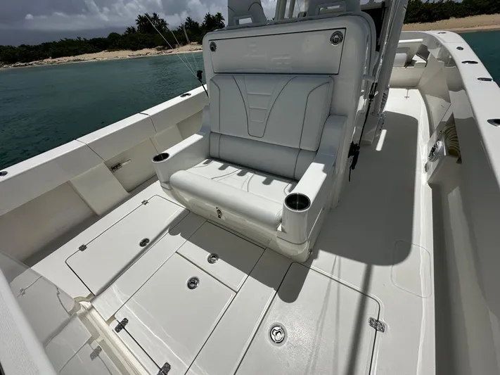  Yacht Photos Pics 2024 SeaVee 340Z boat interior with white seating and storage compartments.