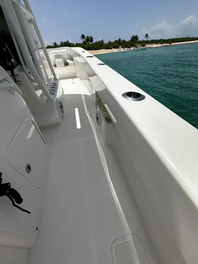  Yacht Photos Pics 2024 SeaVee 340Z boat deck with ocean view and distant shoreline.