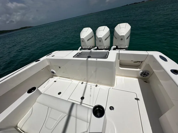  Yacht Photos Pics 2024 SeaVee 340Z boat with triple Mercury engines on open water.