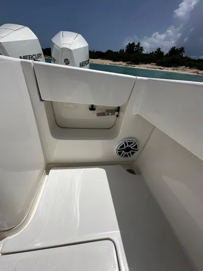  Yacht Photos Pics 2024 SeaVee 340Z boat interior with Mercury engines, coastal background.