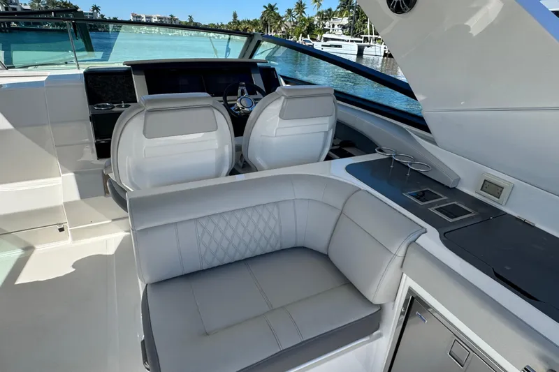 C3 Yacht Photos Pics 2022 Sea Ray SLX 400 Outboard interior with luxurious seating and modern helm.