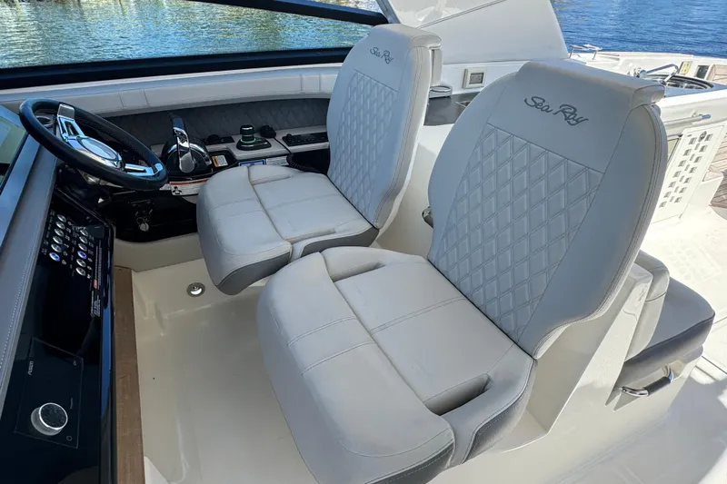 C3 Yacht Photos Pics 2022 Sea Ray SLX 400 Outboard cockpit with luxurious seating and modern controls.