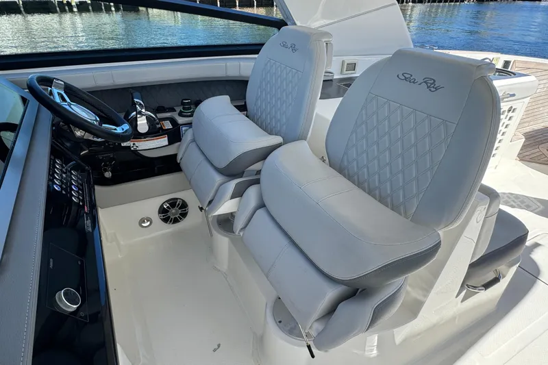C3 Yacht Photos Pics 2022 Sea Ray SLX 400 Outboard cockpit with luxurious seating and modern controls.