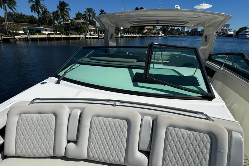 C3 Yacht Photos Pics 2022 Sea Ray SLX 400 Outboard boat with luxurious seating and sleek design on the water.