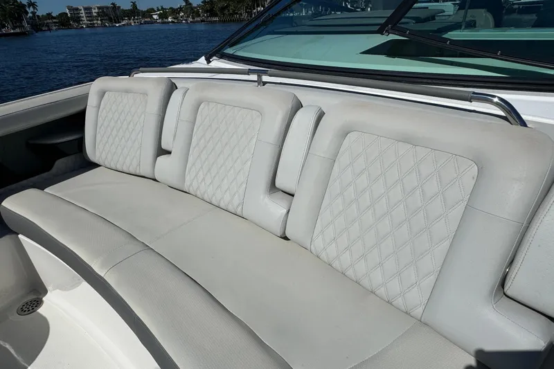 C3 Yacht Photos Pics 2022 Sea Ray SLX 400 Outboard boat with luxurious white seating and diamond stitching.