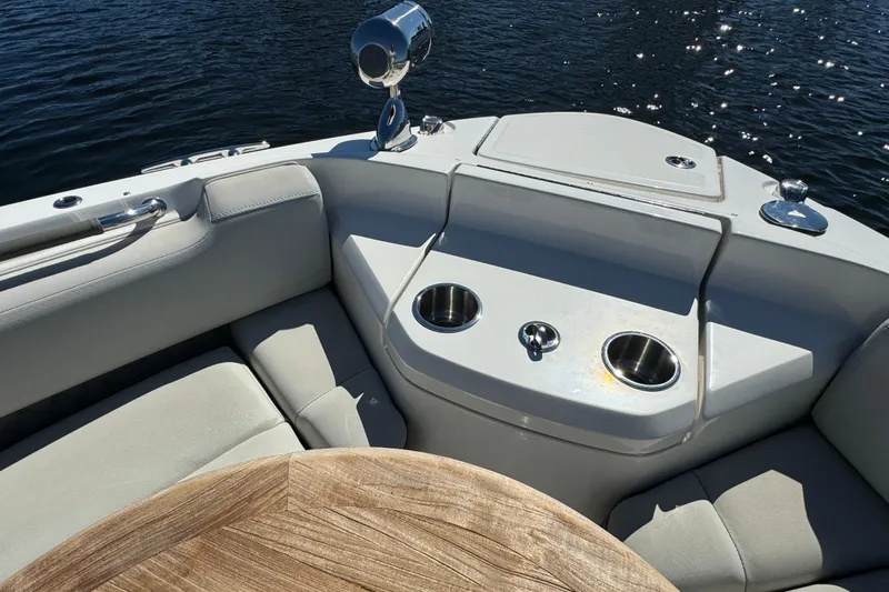 C3 Yacht Photos Pics 2022 Sea Ray SLX 400 Outboard boat interior with seating and cup holders.
