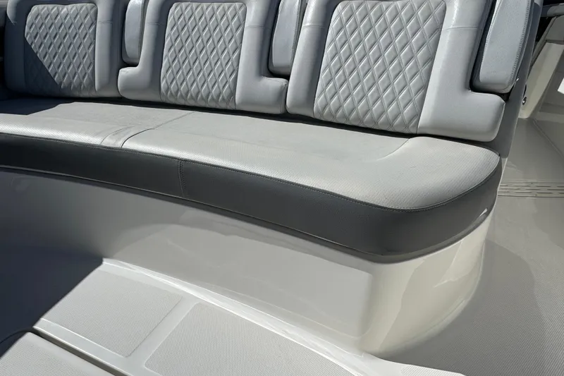 C3 Yacht Photos Pics Luxurious seating on 2022 Sea Ray SLX 400 Outboard boat with diamond-pattern upholstery.