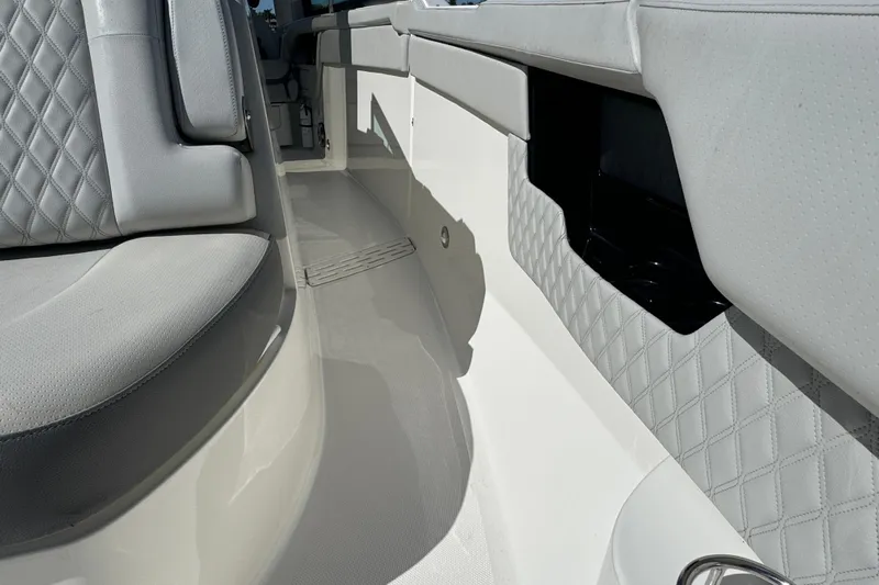 C3 Yacht Photos Pics 2022 Sea Ray SLX 400 Outboard interior with luxurious seating and quilted upholstery.