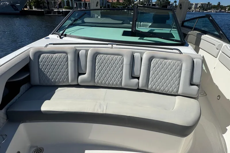 C3 Yacht Photos Pics 2022 Sea Ray SLX 400 Outboard boat with luxurious seating and waterfront view.