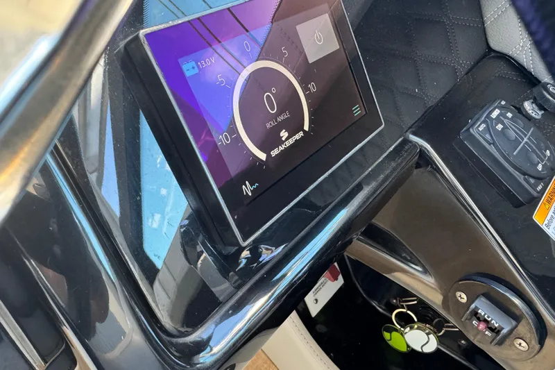 C3 Yacht Photos Pics 2022 Sea Ray SLX 400 Outboard dashboard with digital display and controls.