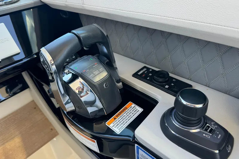 C3 Yacht Photos Pics Control panel of 2022 Sea Ray SLX 400 Outboard with joystick and throttle.