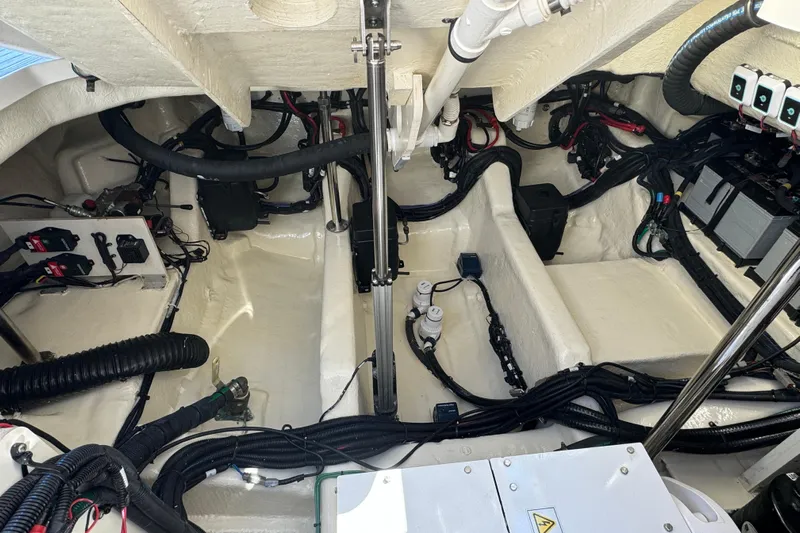C3 Yacht Photos Pics Engine compartment of 2022 Sea Ray SLX 400 Outboard, showcasing wiring and components.