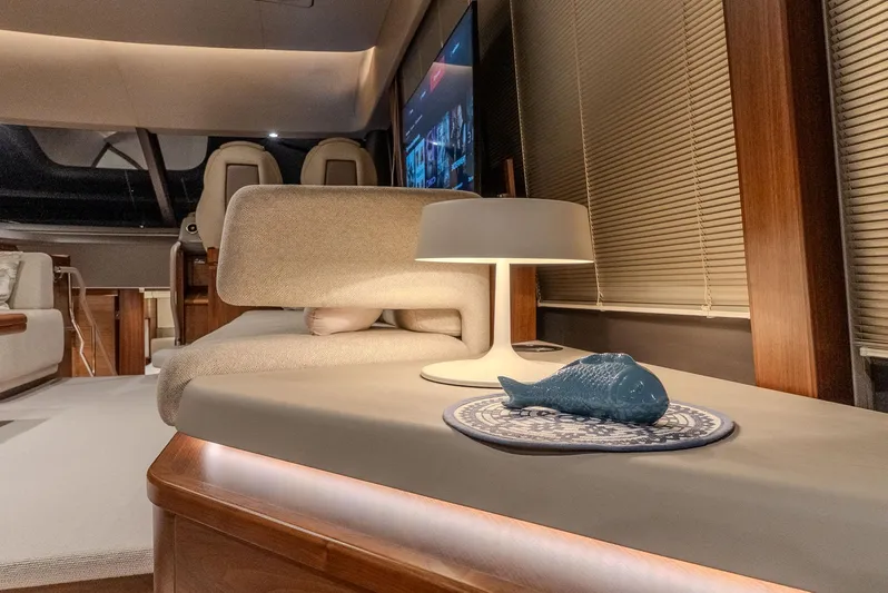  Yacht Photos Pics Luxurious interior of 2024 Princess F55 yacht with modern decor and ambient lighting.