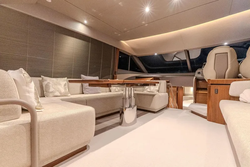  Yacht Photos Pics Luxurious interior of 2024 Princess F55 yacht with elegant seating and modern design.