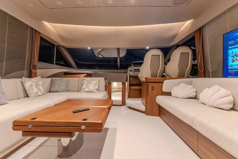  Yacht Photos Pics Luxurious interior of 2024 Princess F55 yacht with elegant seating and modern design.