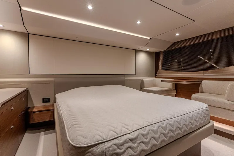  Yacht Photos Pics Luxurious interior of 2024 Princess F55 yacht with modern bedroom design.
