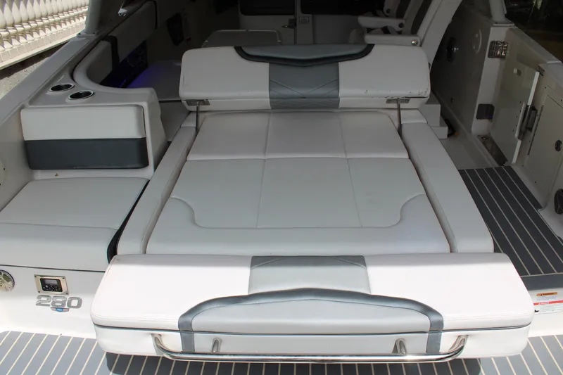  Yacht Photos Pics 2021 Chaparral 280 OSX boat interior with convertible seating and modern design.
